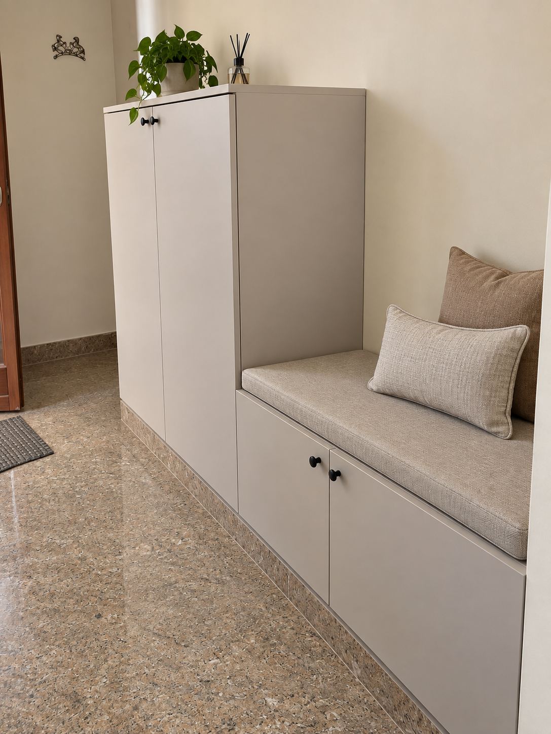 Foyer storage unit with cushioned bench seating