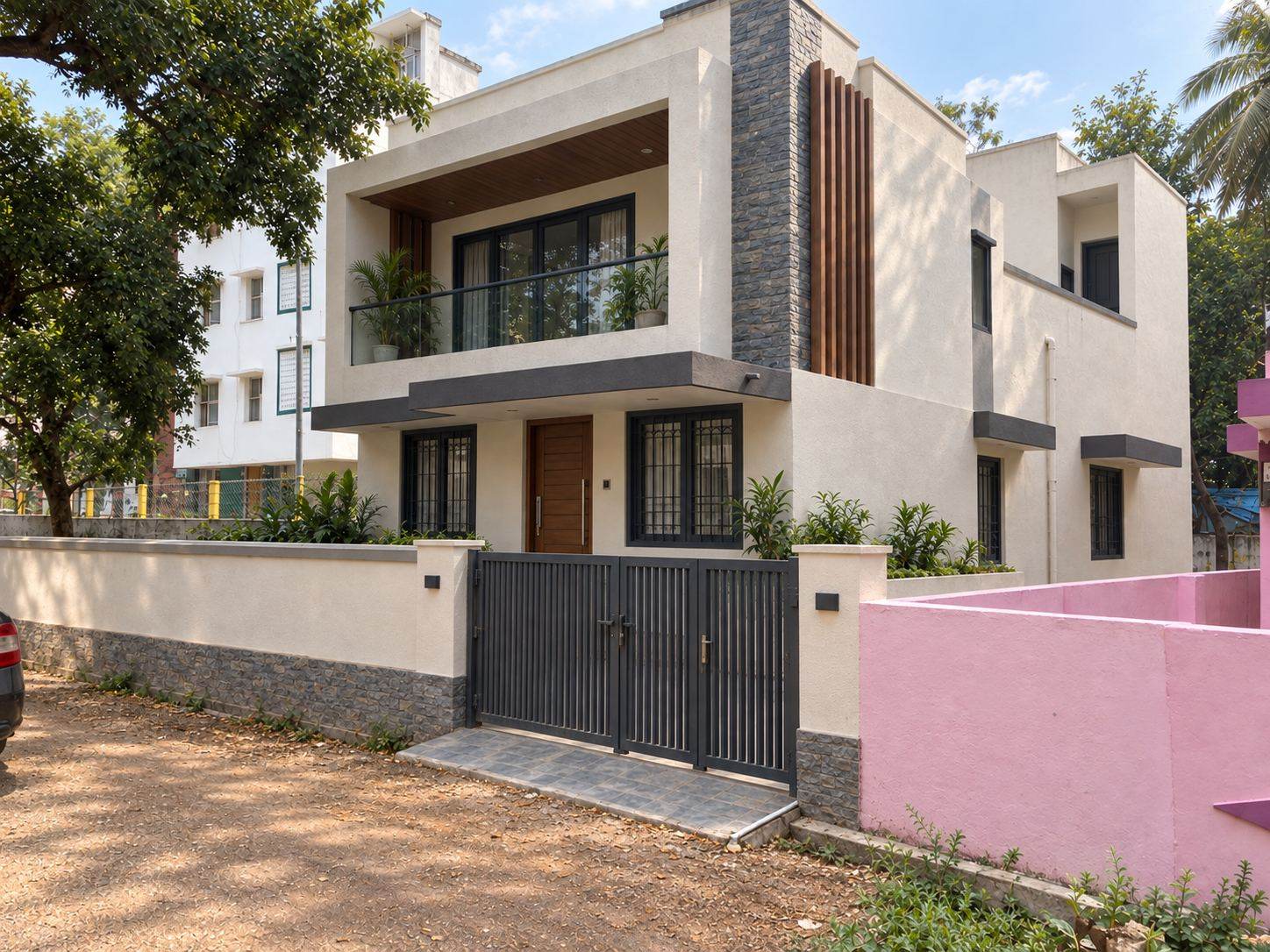 Completed villa with balcony and wood-slat accent, ready for move-in